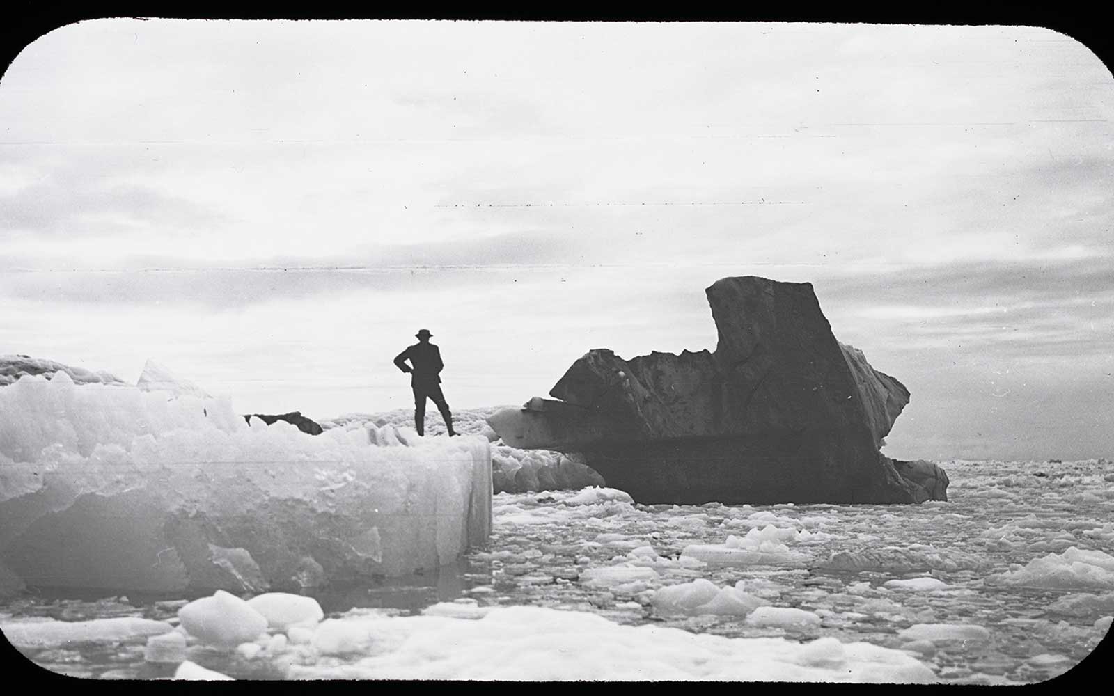 1909 lantern slide by Ralph Stockman Tarr of a “black iceberg” in Alaska.